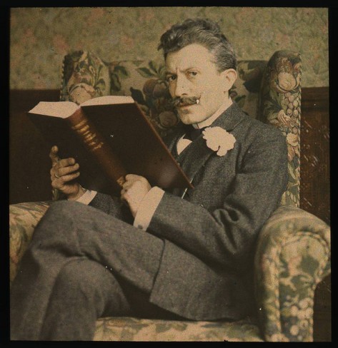 man-reading-old-book